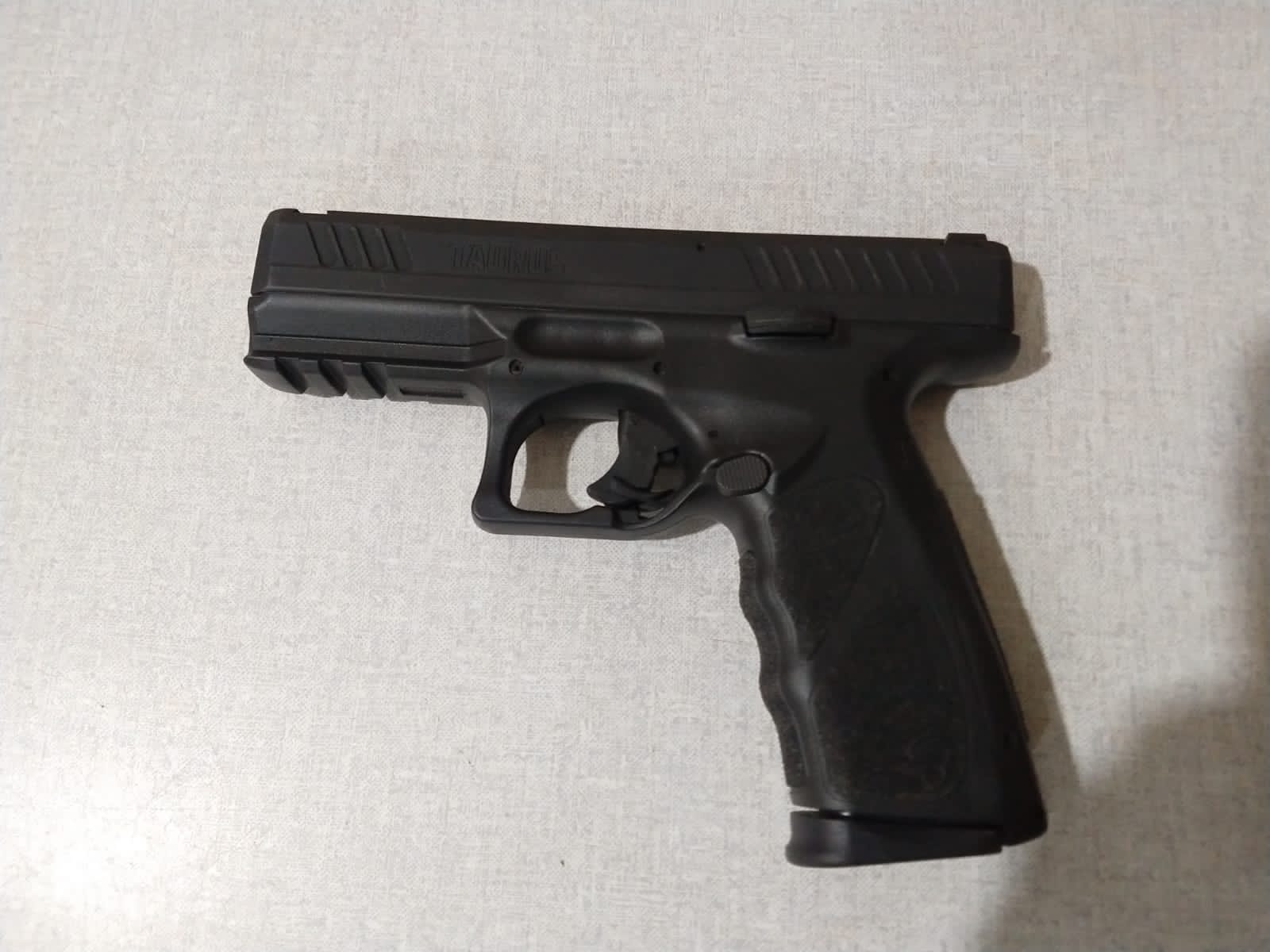 Pistola Apreendida  